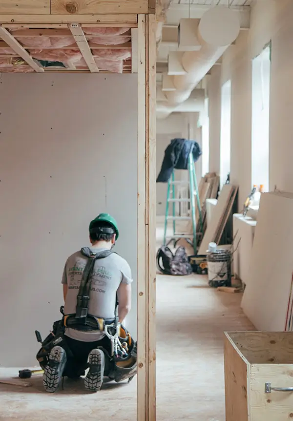 sbb-hom-000009-contractor-fixing-interior-wall-of-house