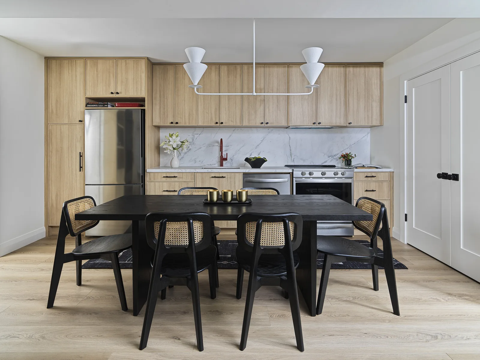 sbb-prj-67-herbert-006-modern-kitchen-with-oak-cabinets-and-black-dining-table